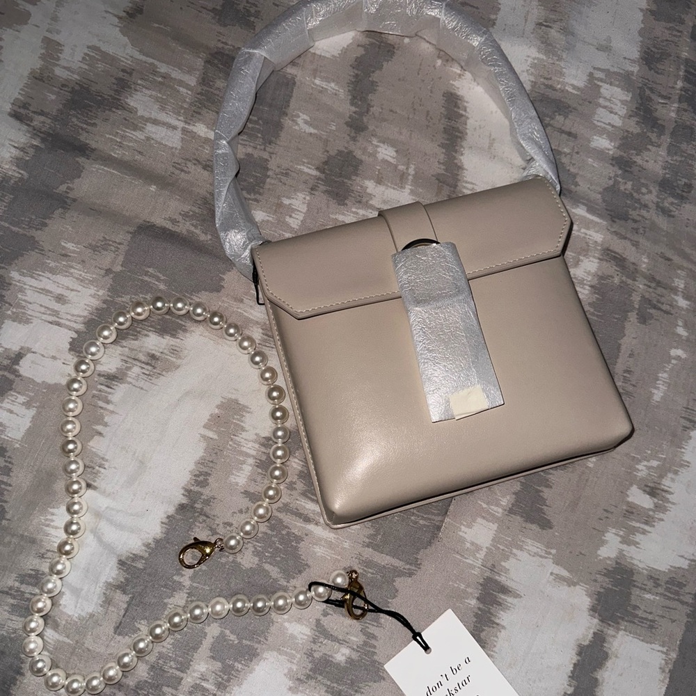Senreve Cavalla Saddle Bag in Ivory with a Pearl Shoulder Chain